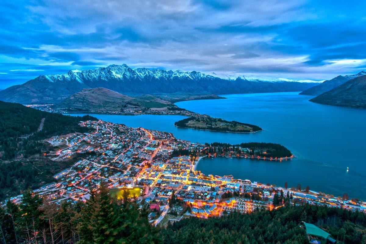 View of Queenstown on the South Island of New Zealand with the snow-capped peaks of the 