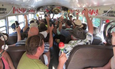 Passengers form an orchestra on the Hummingbird bus